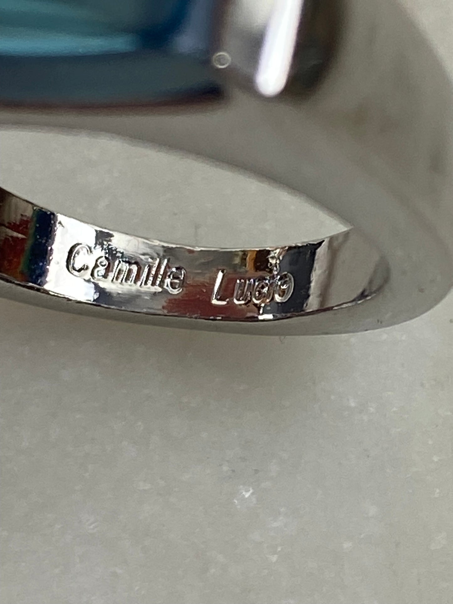 Elegant Blue Solitaire Ring by Camille Lucie