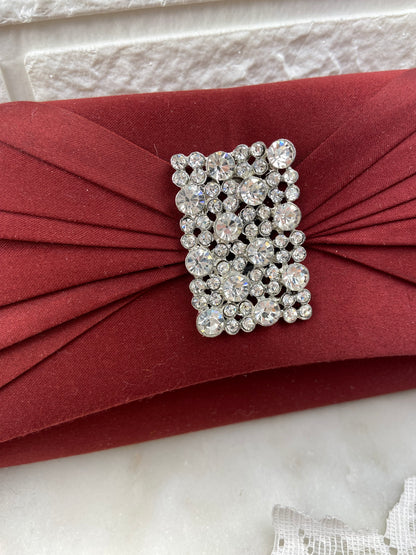 Pleated Satin Clutch with Metal Strap and Rhinestone Embellishment by Roberto Vianni