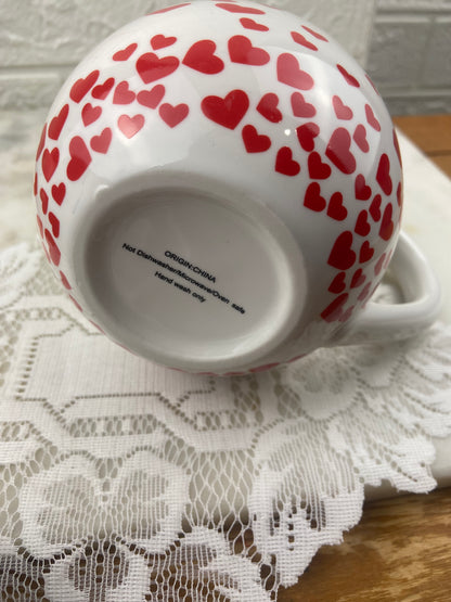 Rounded Porcelain Coffee Mug with Red Hearts