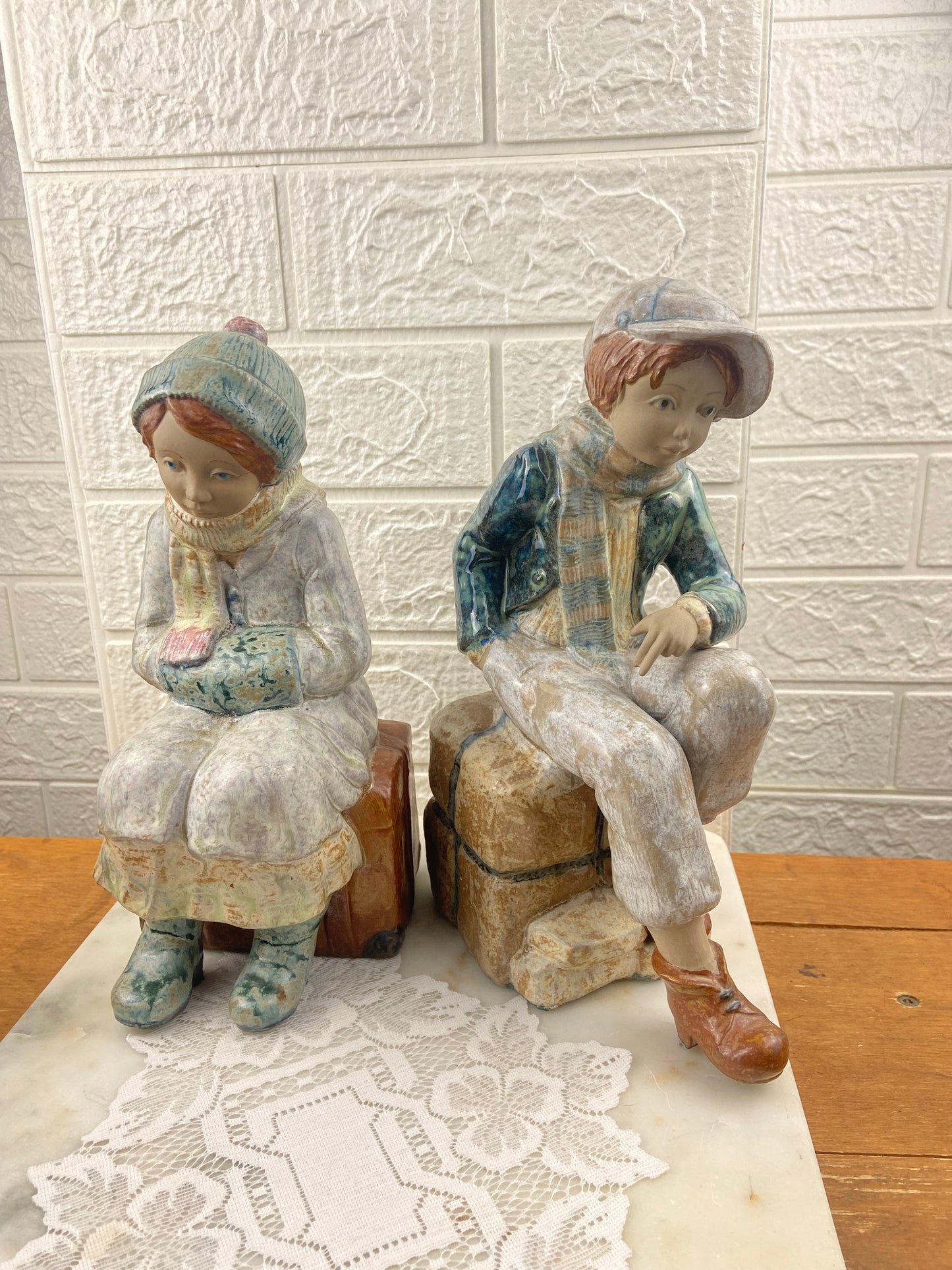 Porcelain Figurine | Girl Sitting on Luggage by Porcelana Artistica Levantina (PAL)