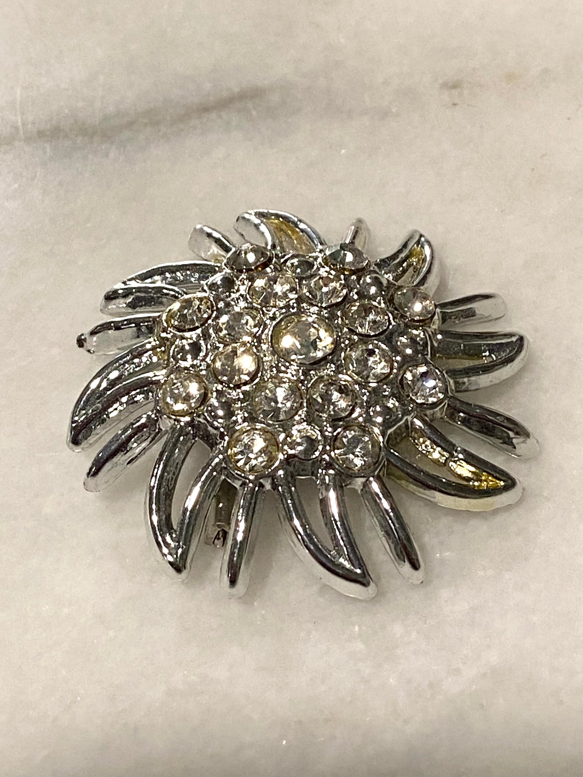 Silver-Tone Sunburst Brooch with Rhinestones