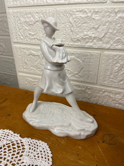 Porcelain Walking Woman Holding Child
