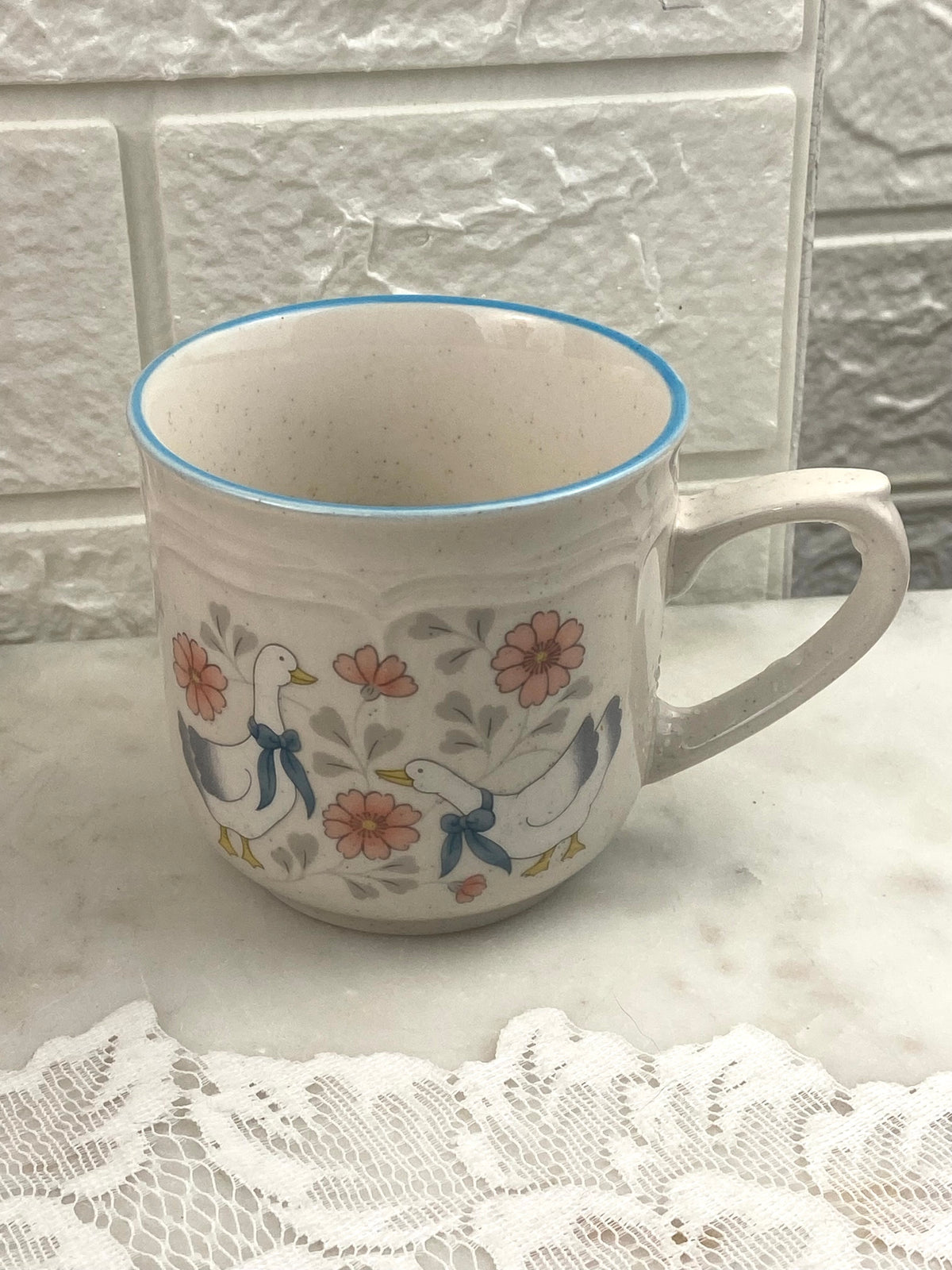 Small Speckled Stoneware Coffee Mug with Blue Ribbons and Geese Pattern