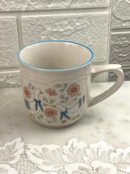 Small Speckled Stoneware Coffee Mug with Blue Ribbons and Geese Pattern