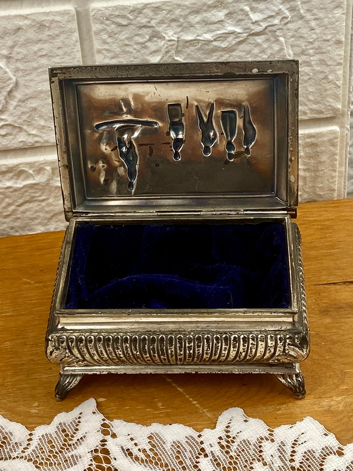 Footed Metal Jewelry Box with Embossed Lid and Navy Blue Velvet Lining