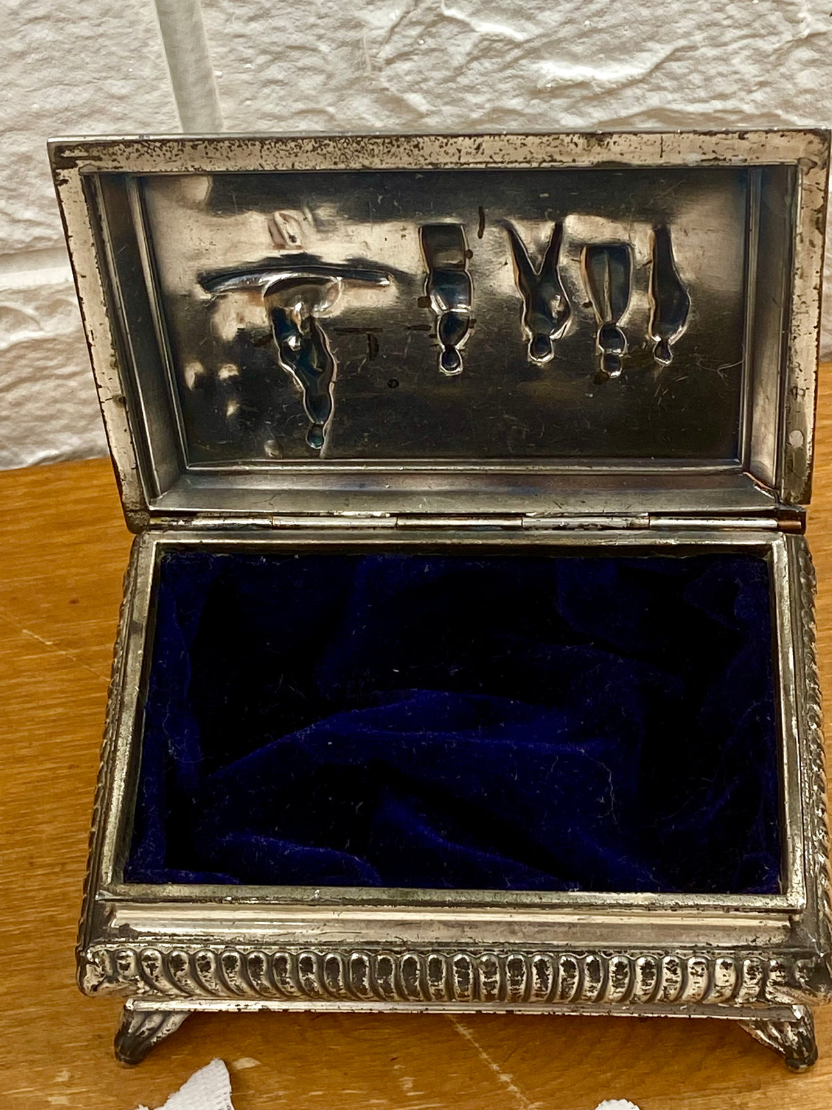 Footed Metal Jewelry Box with Embossed Lid and Navy Blue Velvet Lining