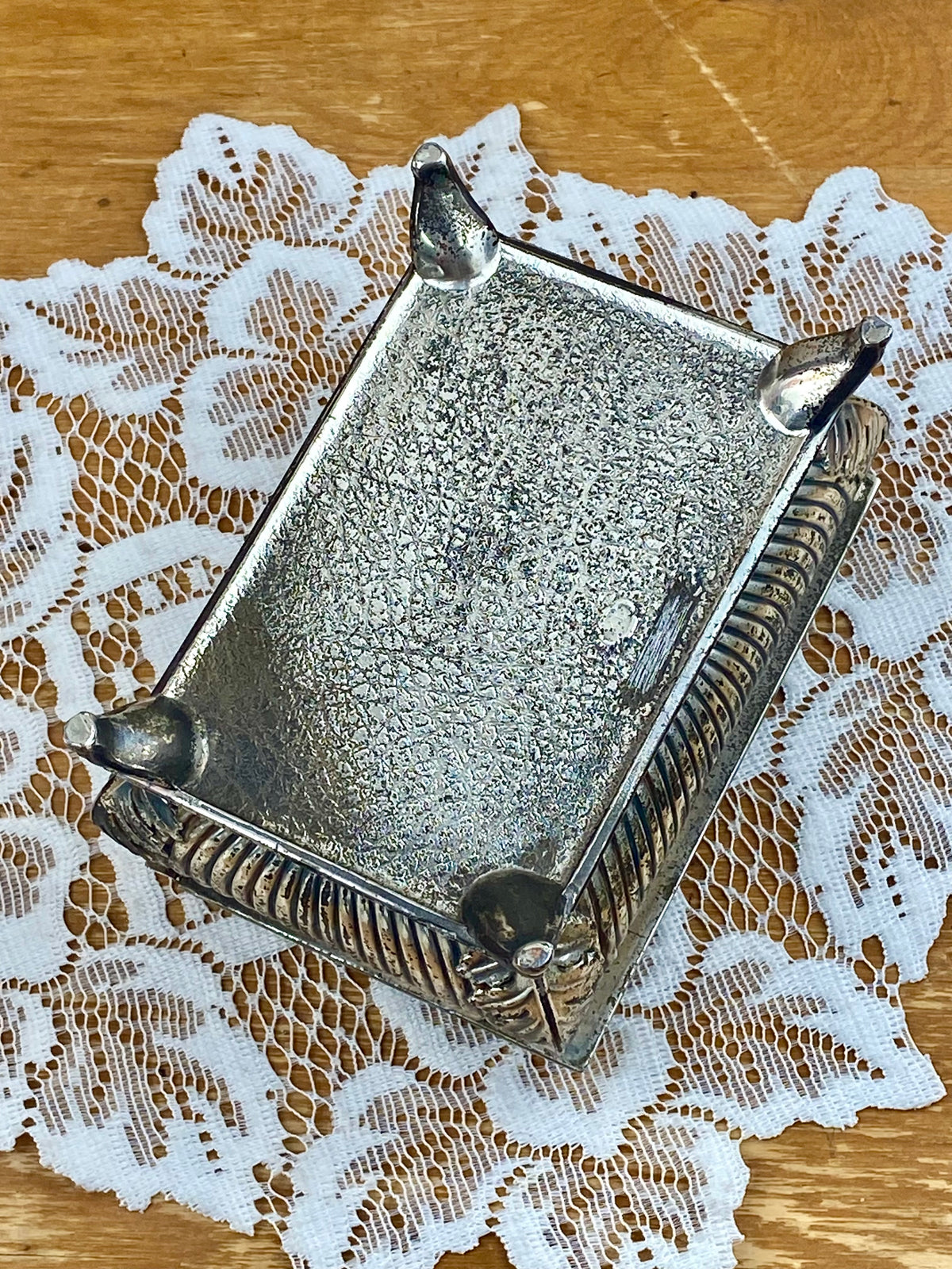 Footed Metal Jewelry Box with Embossed Lid and Navy Blue Velvet Lining