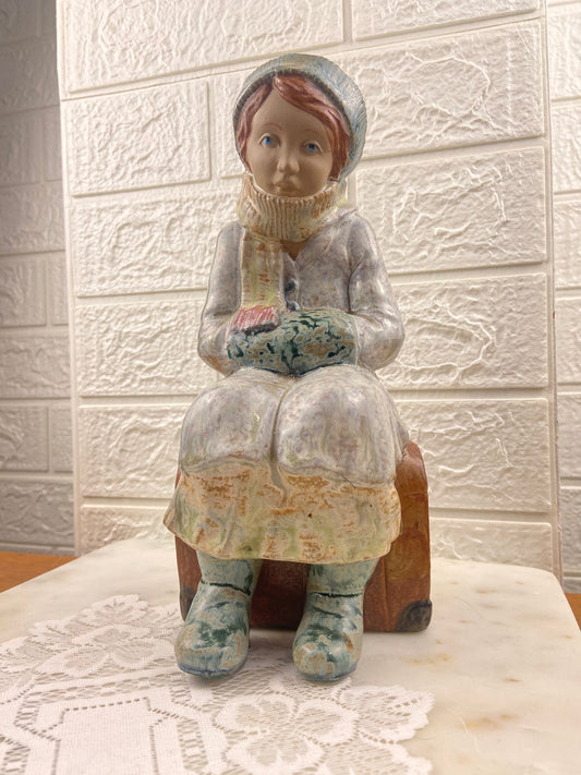 Porcelain Figurine | Girl Sitting on Luggage by Porcelana Artistica Levantina (PAL)