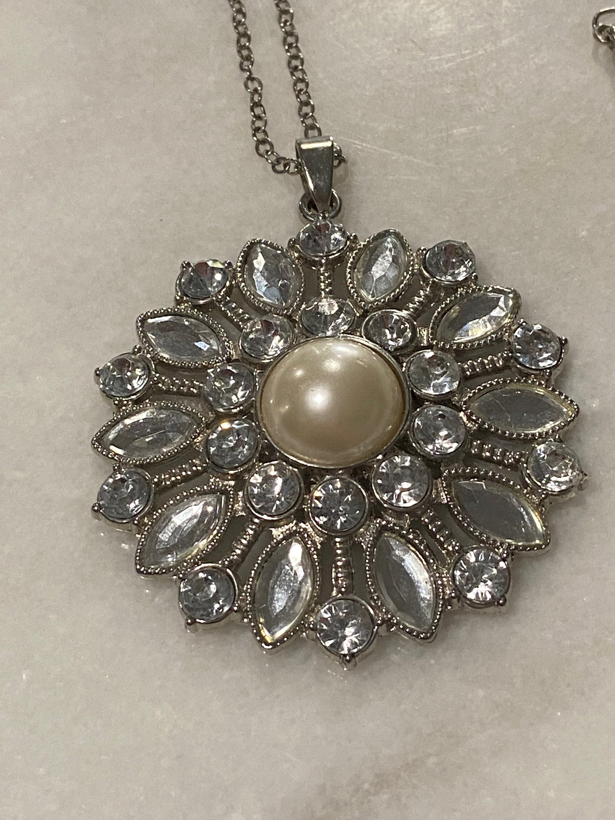 Silver-Tone Starburst Pendant with Rhinestones and Faux Pearl Cabochon and 18” Necklace