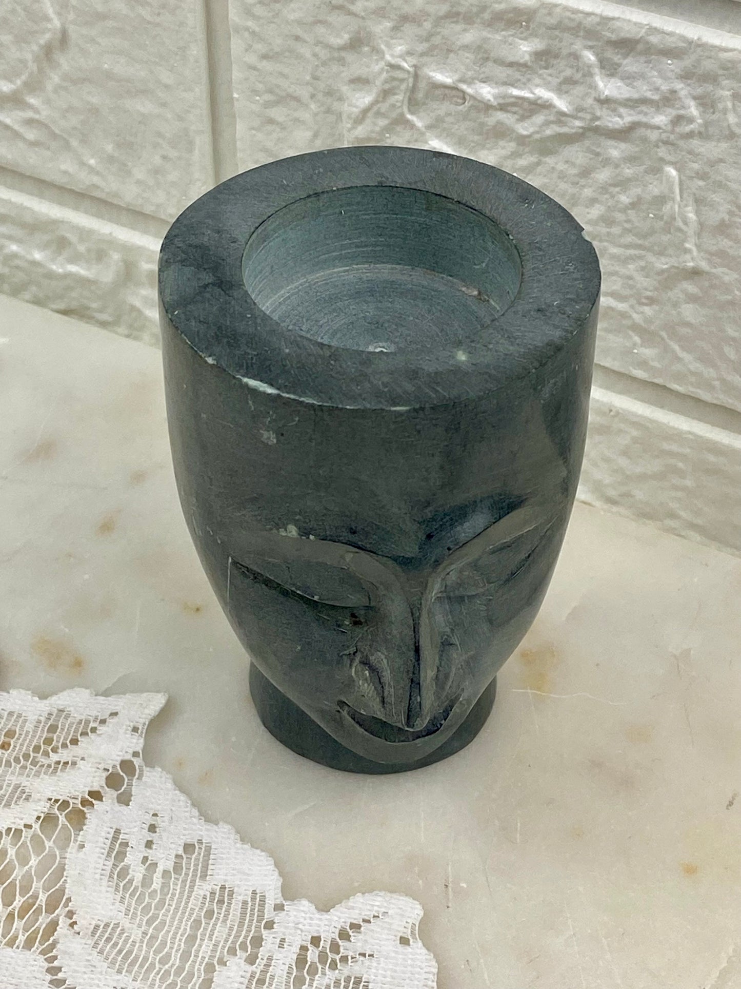 Small Carved Stone Head Candle Holder