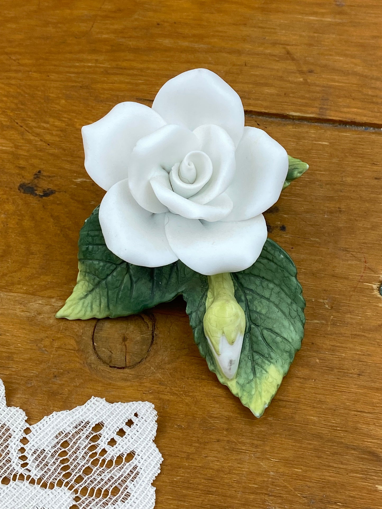 Small White Porcelain Rose on a Branch