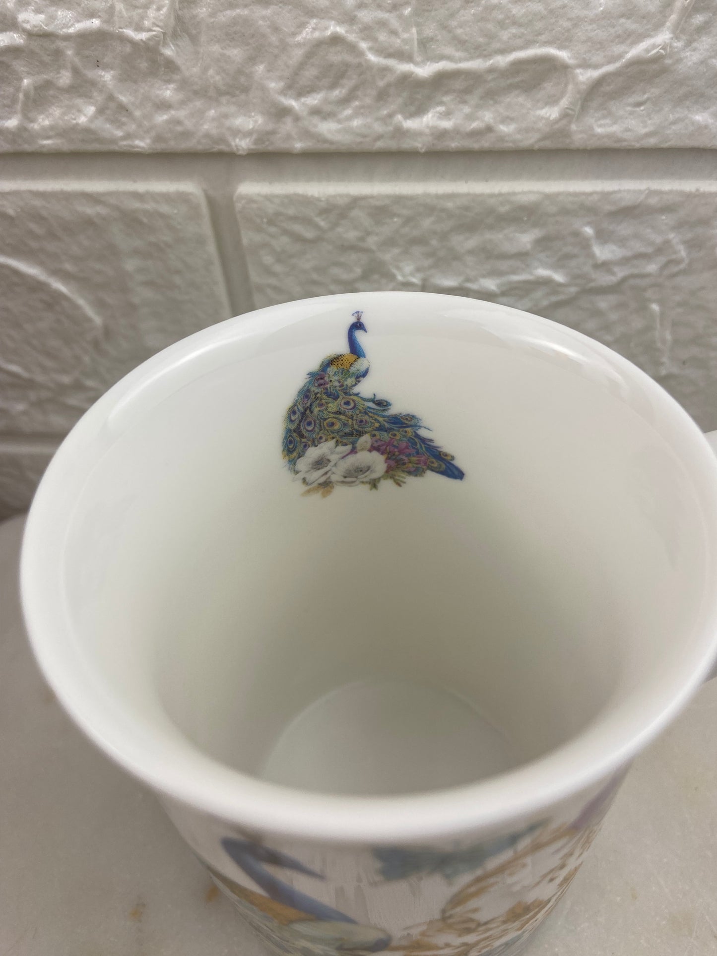 Porcelain Coffee Mug with Peacock Design by Summer River
