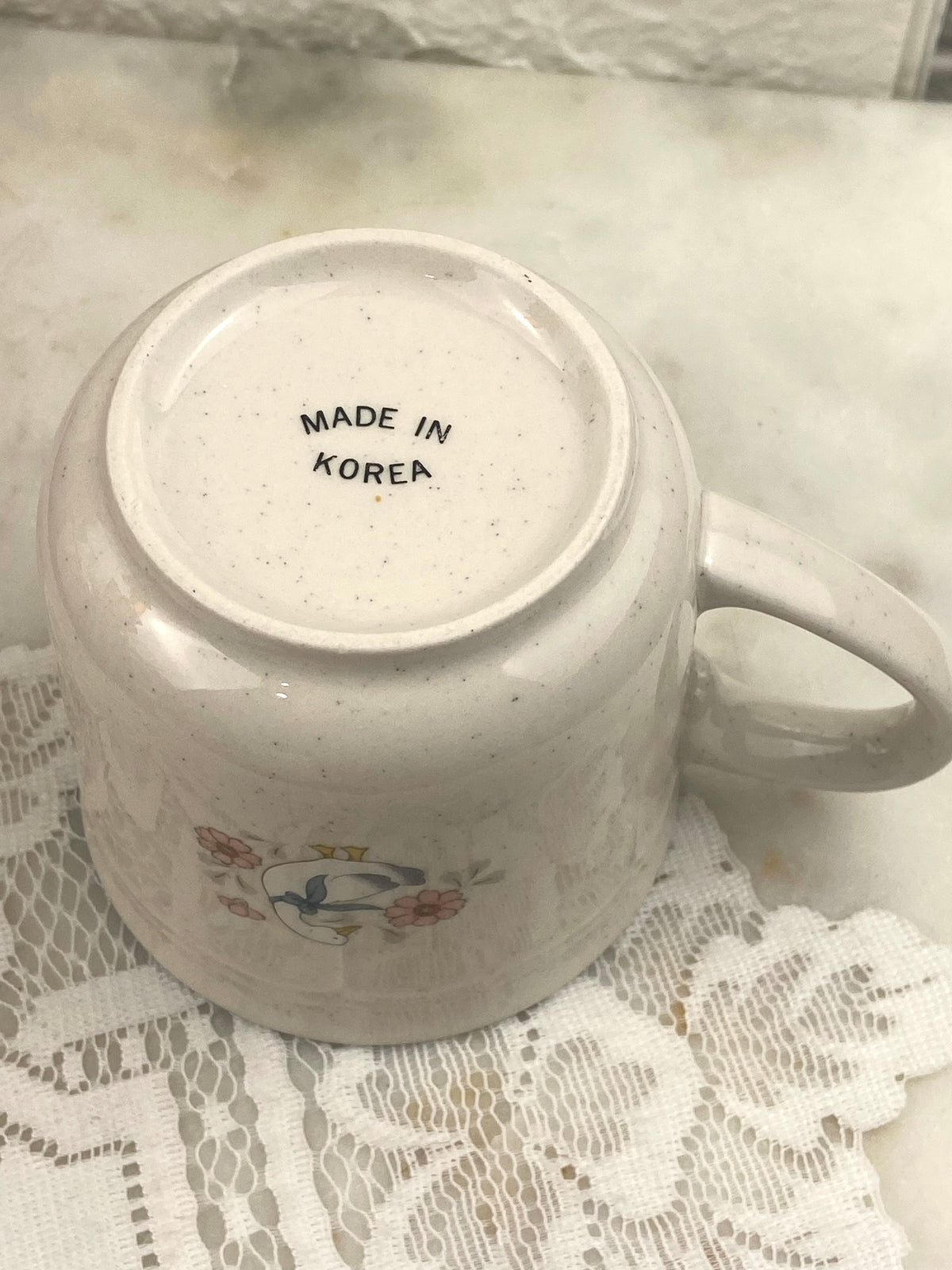 Small Speckled Stoneware Coffee Mug with Blue Ribbons and Geese Pattern