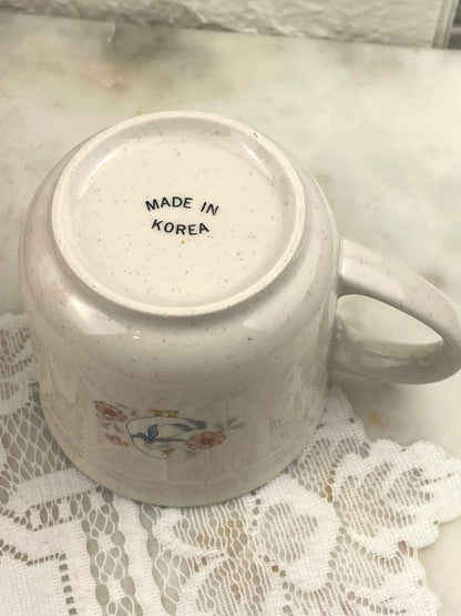Small Speckled Stoneware Coffee Mug with Blue Ribbons and Geese Pattern