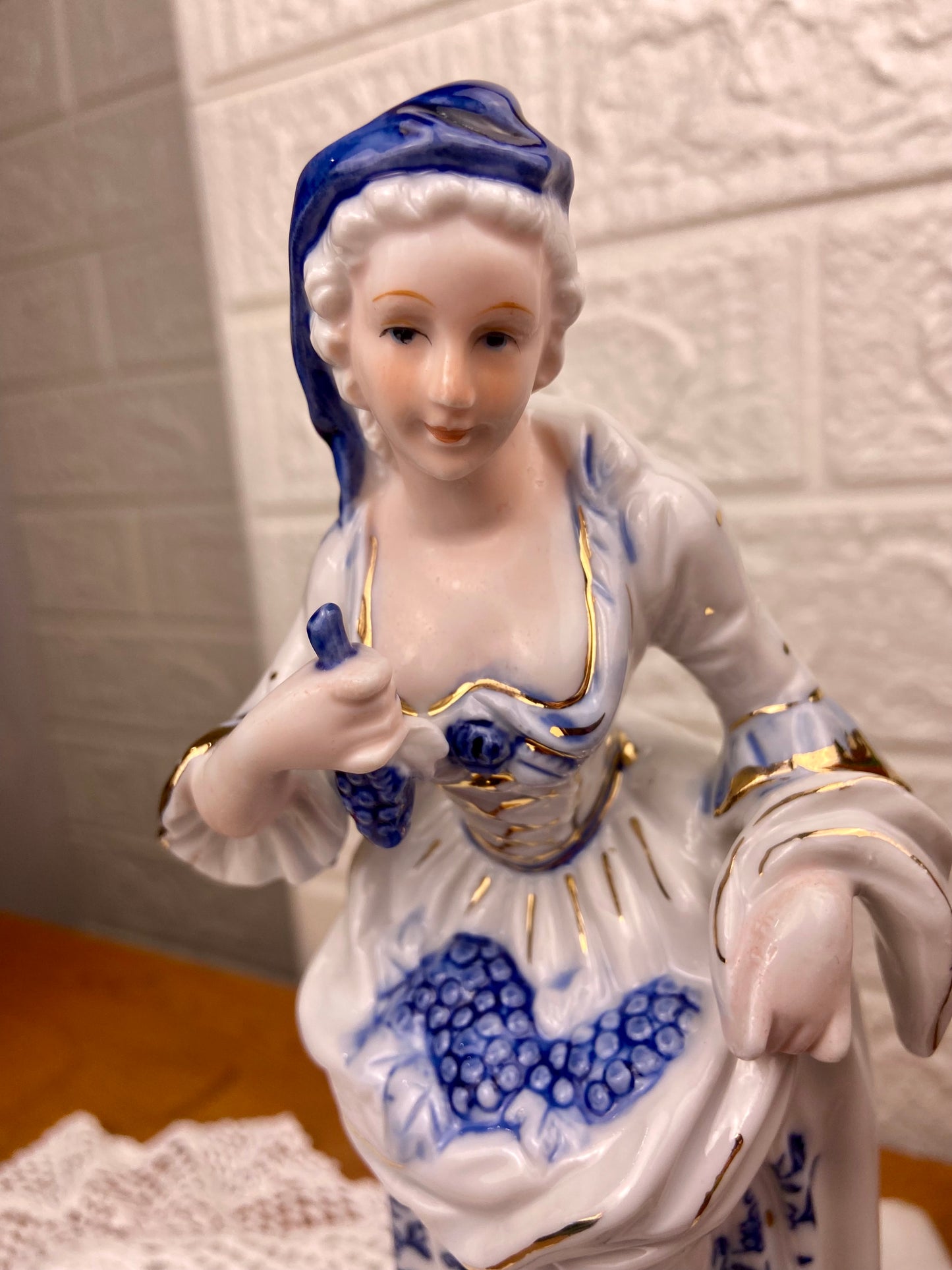 Blue & White Porcelain Figurine | Woman Gathering Grapes