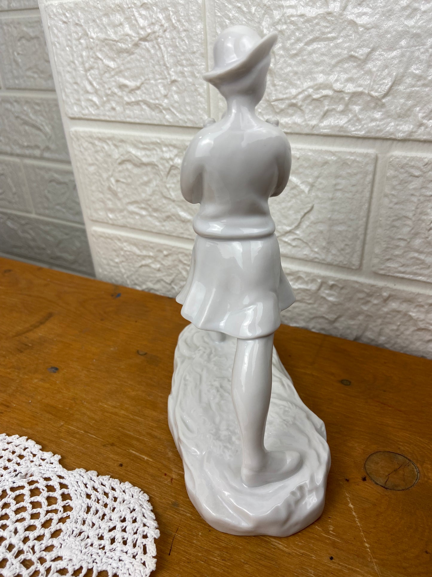 Porcelain Walking Woman Holding Child