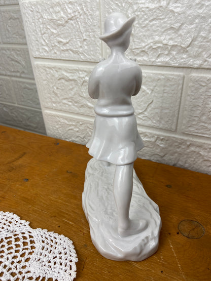 Porcelain Walking Woman Holding Child