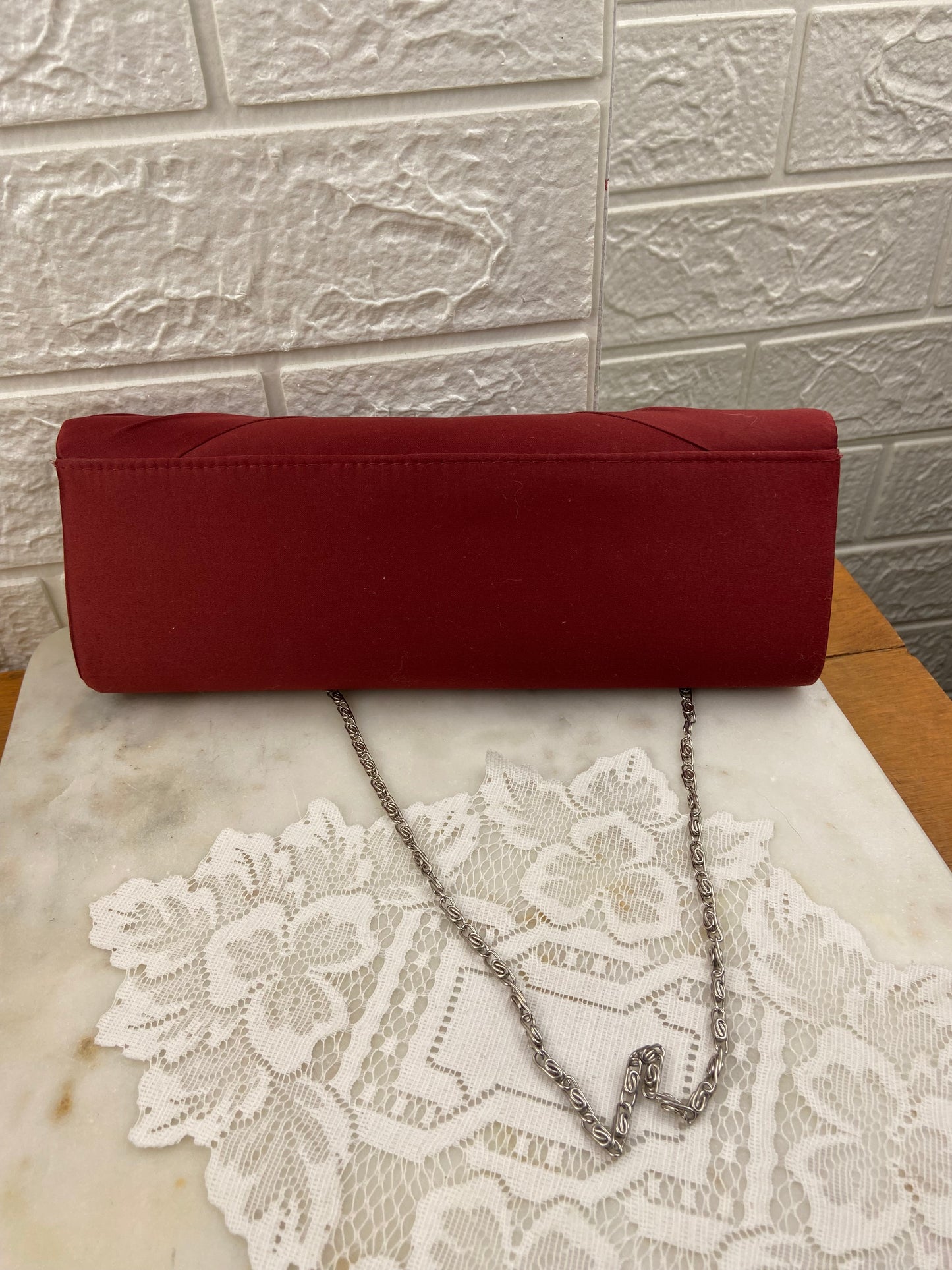 Pleated Satin Clutch with Metal Strap and Rhinestone Embellishment by Roberto Vianni