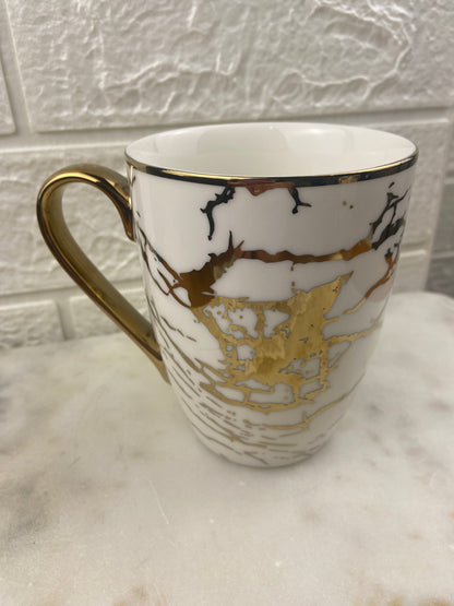 White and Gold-Tone Marbled Coffee Mug by Certified International