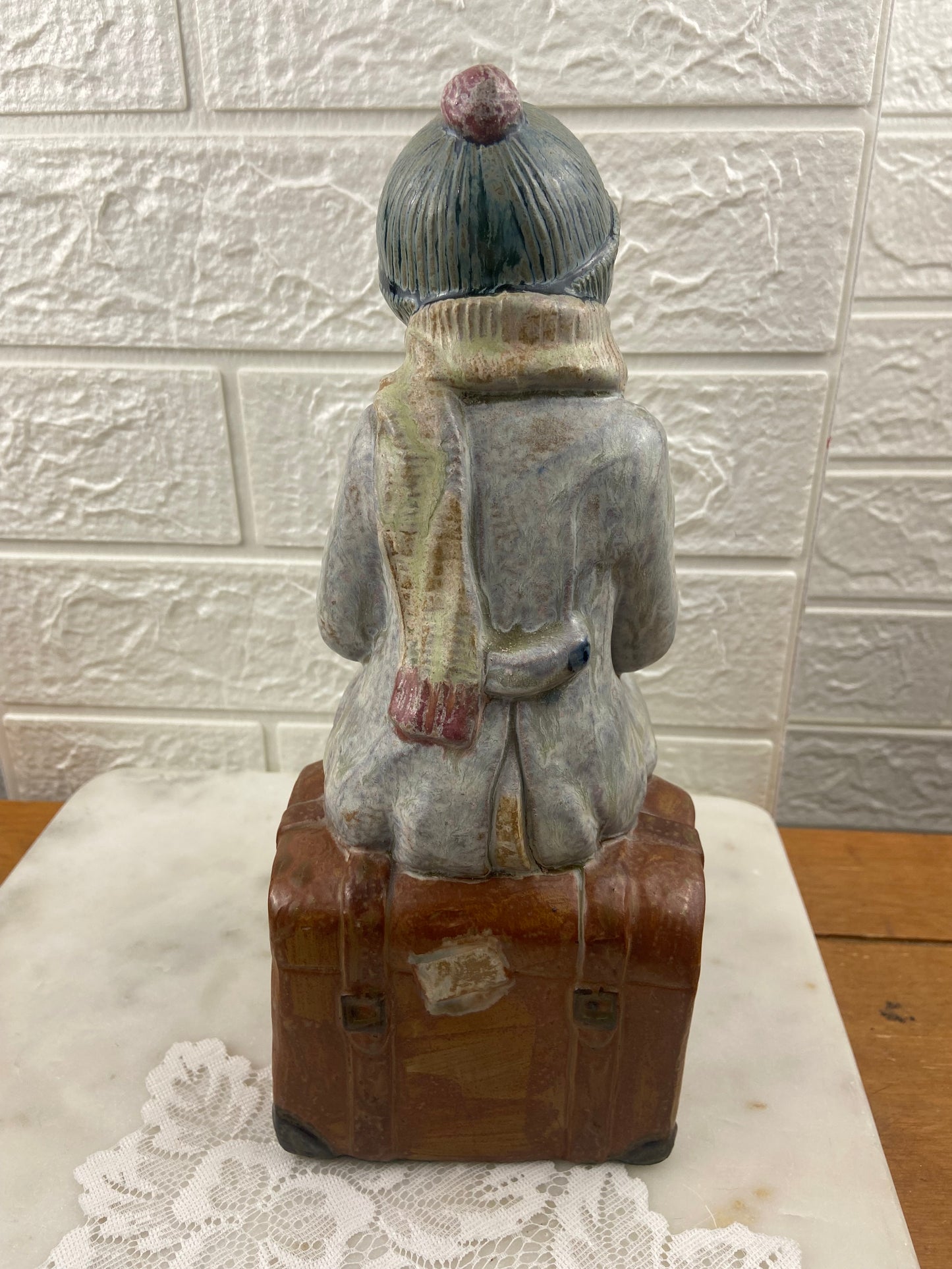 Porcelain Figurine | Girl Sitting on Luggage by Porcelana Artistica Levantina (PAL)